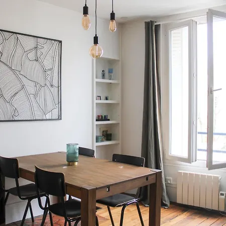 Luminous And Flowing Cocoon Apartment Paris